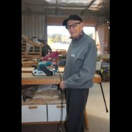 Bill Rigney using the sander